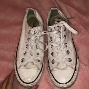 White converse with blue and red stripes